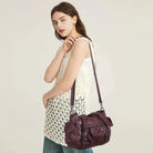 Textured Multi-Pocket Shoulder Bag with Rivet Details