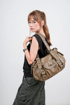 Textured Multi-Pocket Shoulder Bag with Rivet Details